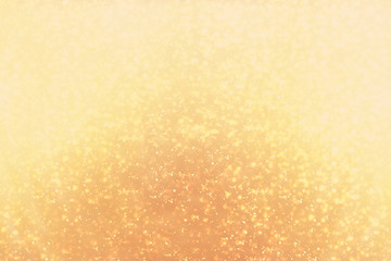 Golden round bokeh or glitter lights festive gold background. Christmas abstract template