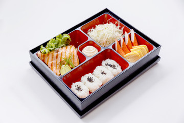 Grilled Salmon Bento with Salad, Kani (Crab Stick) and Tamagoyaki (Japanese Omelette)
