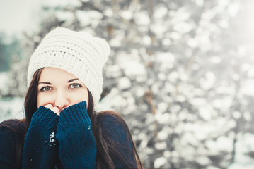 Happy winter moments of joyful young woman with long brunette hair