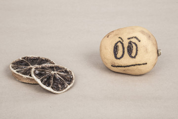 lemon with sad expression