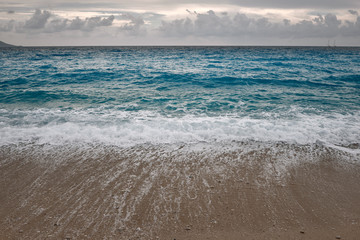 Sea beach waves. Close-up view. 
