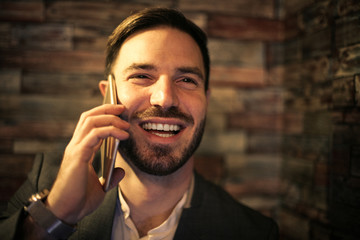 Businessman using phone in the office.