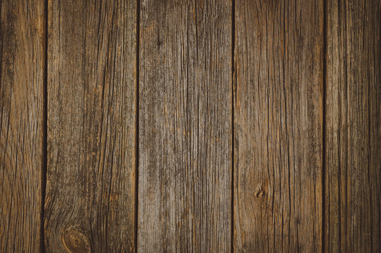 Old wood texture with natural wooden patterns. Top view of a vintage floor or table for background or theme.