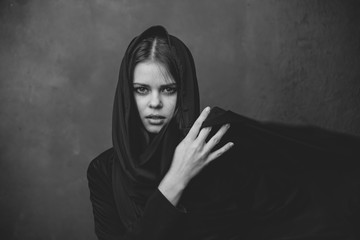 black white photo, gray tone, pretty woman in a dress