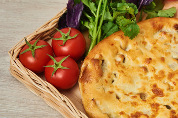 Kubdari is a traditional Georgian dish of meat-filled bread