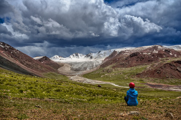 Fototapeta na wymiar climber on background mountain river and mountains