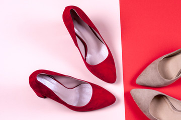 Red and pastel female high-heeled shoes