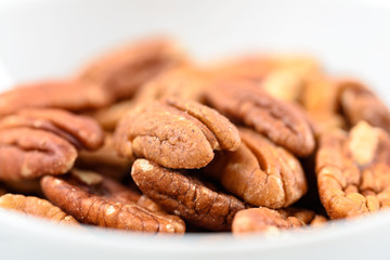 Pecan Nuts In White Bowl On Table