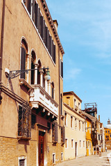 Fototapeta premium Traditional street view of old buildings in Venice, ITALY