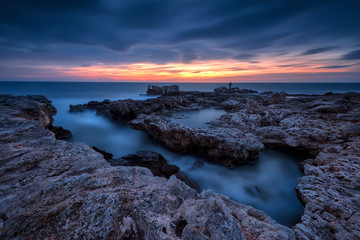 Catching the sunrise /
Magnificent sea sunrise at the rocky coast near Shabla, Bulgaria