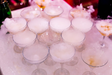 mountain glasses of champagne, a bottle of stream