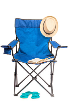 folding chair and objects for a summer vacation in nature isolat