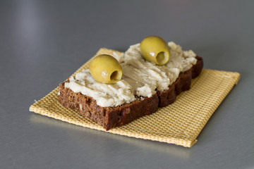 Vorschmack or forshmak is Jewish cuisine dish made of salty minced fish, egg, apple on wholegrain bread.