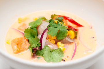  Sea bass ceviche with pumpkin, cilantro, corn and onion