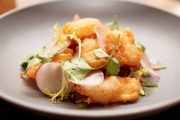 Fish tempura in grey porcelain plate