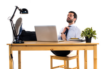 Fototapeta premium Businessman working with laptot in his office