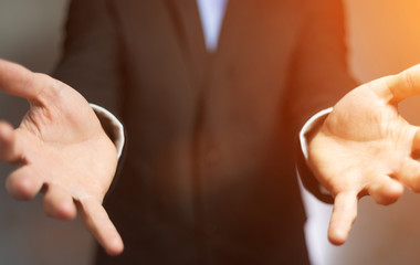 Businessman showing his empty hand