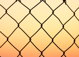 Fototapeta premium metal grid at sunset