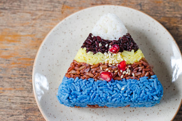  five colors of rice for vitamin and healthy meal on wooden table. Eating Healthy concept.