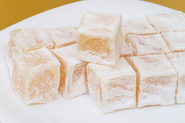 Lukum in powdered sugar