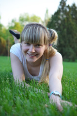 Fototapeta premium Young funny girl in a meadow