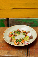 Healthy appetizer with quinoa and seafood