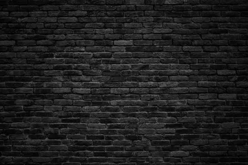 Abwaschbare Fototapete Ziegelwand schwarze Backsteinmauer, dunkler Hintergrund für Design
