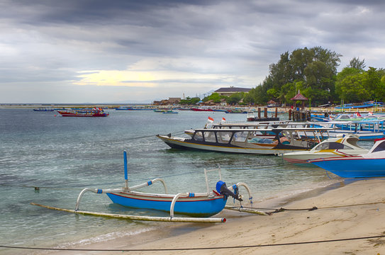 Moored passenger and fishing boats on the island of Gili Air.