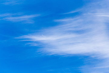 clouds in the blue sky as background