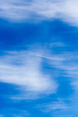 clouds in the blue sky as background