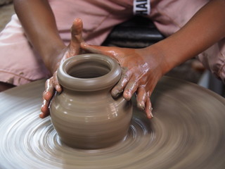 Close up of hands doing the pottery, Selective focus at pottery.