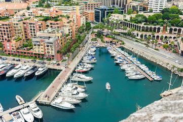 Monte Carlo harbour city panorama. View of luxury yachts and apartments in harbor of Monaco