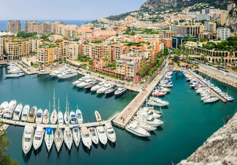 Monte Carlo harbour city panorama. View of luxury yachts and apartments in harbor of Monaco