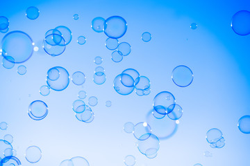 Soap bubbles blue abstract background