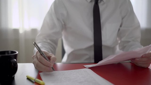Man looking at paperwork