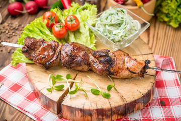 Delicious juicy skewered meat or shish kebabs on skewers of pork tenderloin. Fragrant and spicy dish.