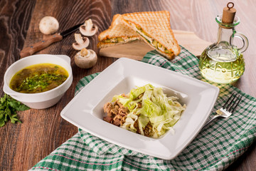 Lunch of soup, salad and sandwich