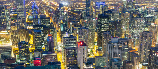 Fototapeta premium Illuminated skyscraper buildings, night view