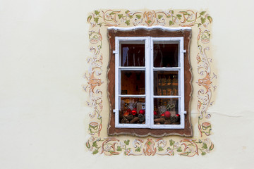 Old Window on Cracked Wall with Christmas Decoration and Copy Space