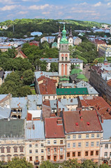 Assumption Orthodox Church with Korniakt Tower and Lviv cityscape, Ukraine