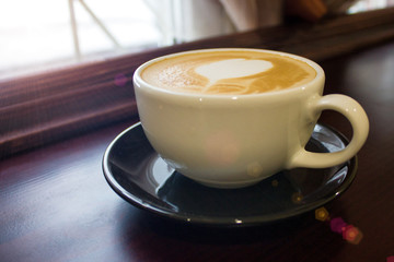 closeup of ht coffe in the cup on table