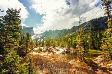 Nature landscape with lake and rocky mountains