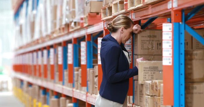 Depressed female warehouse manager