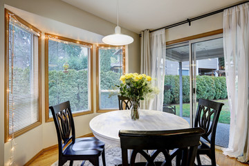 Dining room with curved window wall