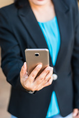 girl hand holding smartphone