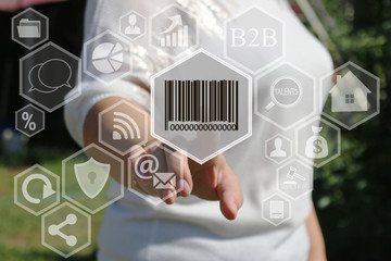 The businesswoman clicks barcode product network icon on the touch screen the web network.