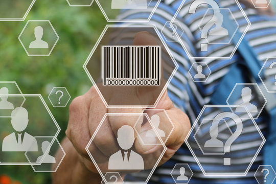 Farmer businessman  clicks barcode product network icon on the touch screen the web network .Tanned hands, male hands of an elderly person.