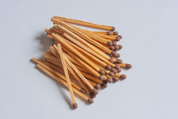 Raw safety matches on the white background