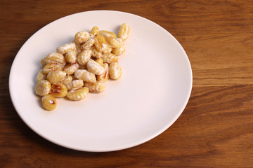 Gnocchi with cream and spices on a white plate. Homemade food. Italian rustic food.