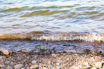 wave on the shore as the background